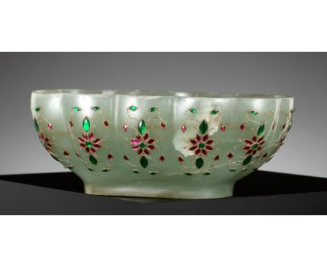 A MUGHAL GILT AND 'GEM'-INLAID AVENTURINE BOWL, NORTHERN INDIA, 19TH CENTURYThe oval body with lobed sides rising from a shor