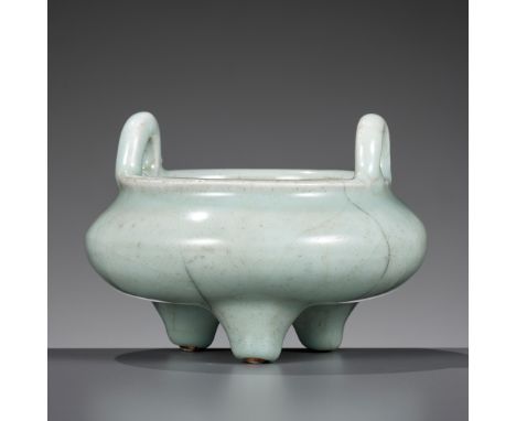 A GUAN-TYPE TRIPOD CENSER, CHINA, 18TH CENTURYThe compressed globular body raised on three short conical feet, the waisted ne