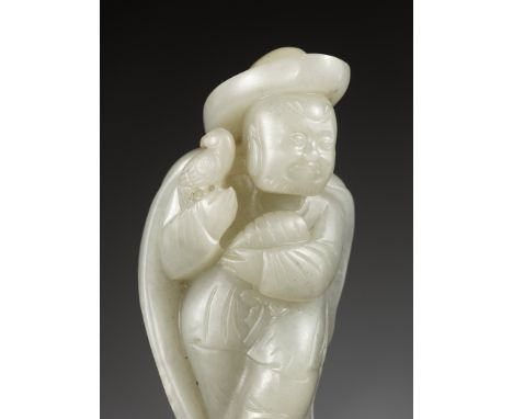 A PALE CELADON JADE FIGURE OF A PERSIAN FALCONER, 18TH CENTURYChina. Finely carved, clad in a long cloak hanging over the sho