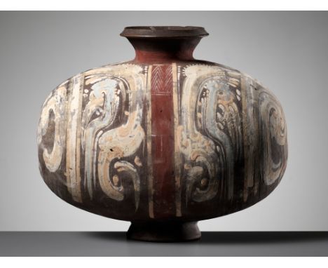 AN ABSTRACTLY PAINTED POTTERY COCOON JAR, HAN DYNASTYChina, 202 BC-220 AD. The rounded oblong body supported on a short pedes