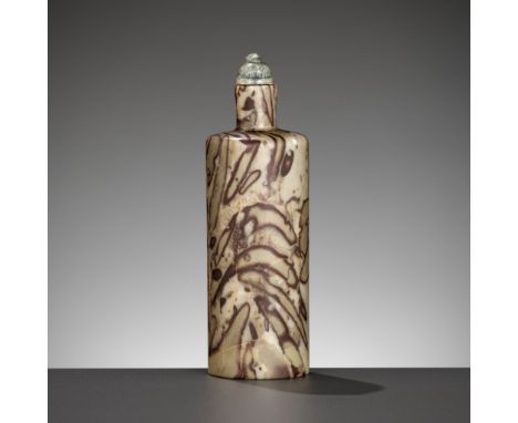 A CYLINDRICAL PUDDINGSTONE SNUFF BOTTLE, 18TH-19TH CENTURYChina. The elegant yet traditional 'Rouleau' form is supported on a