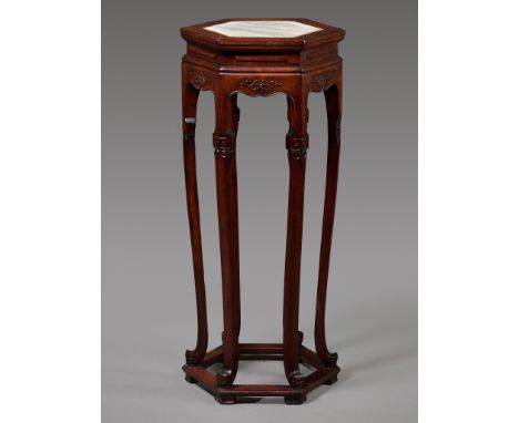 A MARBLE-INSET LACQUERED HARDWOOD INCENSE STAND, XIANGJI, 19TH CENTURYChina. Of hexagonal form, the top neatly inset with a w