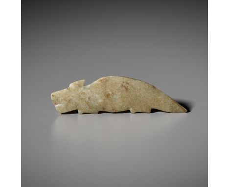 A PALE GREEN JADE 'DRAGON' PENDANT, SHANG TO WESTERN ZHOU DYNASTYChina, 1300-1000 BC. Of flattened form, carved in the form o