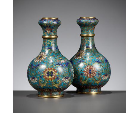 A PAIR OF CLOISONNE ENAMEL GARLIC-MOUTH VASES, QIANLONG TO JIAQING PERIODChina, 1736-1820. Each with a globular body supporte