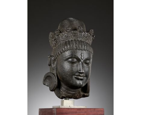 AN IMPORTANT AND MONUMENTAL BLACK STONE HEAD OF TARA, PALA PERIODOpinion: This particular work should be considered a most im