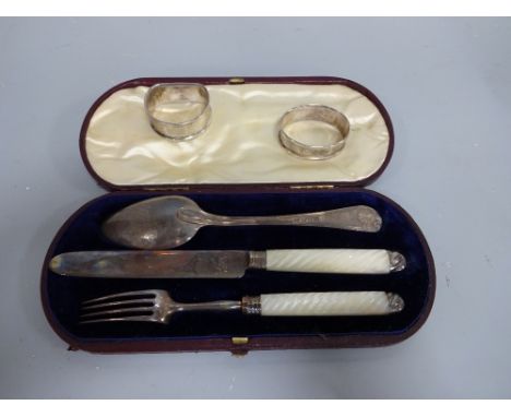 A CASED MONOGRAMMED SILVER BLADED KNIFE AND FORK, with fluted mother of pearl handles, together with silver spoon, London 180