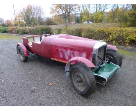 A RED BENTLEY 4 1/4 LITRE SALOON CAR, an MK6 model converted to a sports four seater, the Bentley Saloon body taken off and a