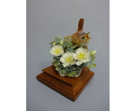 A BOXED LIMITED EDITION ROYAL WORCESTER WREN, Troglodytes Parvulus and Burnet Rose by D. Doughty, with leather framed certifi