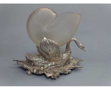 A SILVER PLATED SPOON WARMER, modelled as Swan amongst leaves and reeds having opaque open glass nautilus shell to back on fo