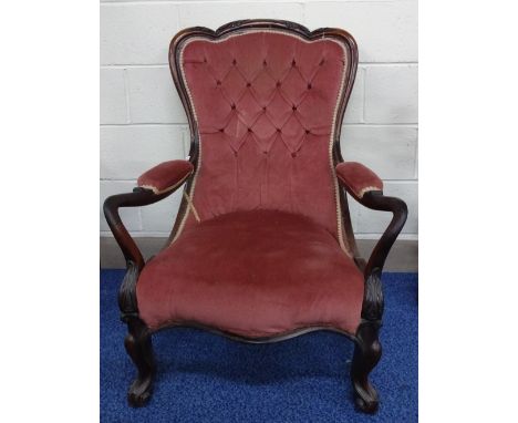 A VICTORIAN ROSEWOOD FRAMED OPEN ARMCHAIR, with shaped back and arms, pink upholstered button back, cabriole scroll legs, cla