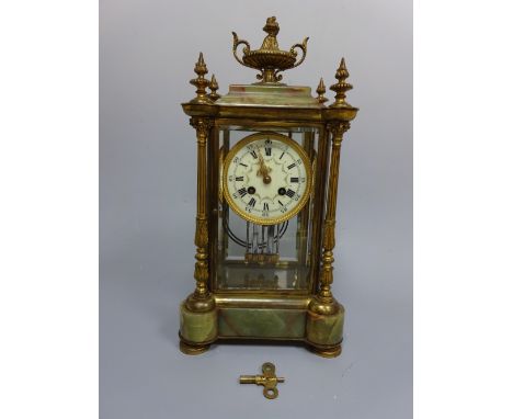 A FOUR GLASS MANTEL CLOCK, having circular white enamelled dial with Roman and Arabic numeral chapter rings, central floral s