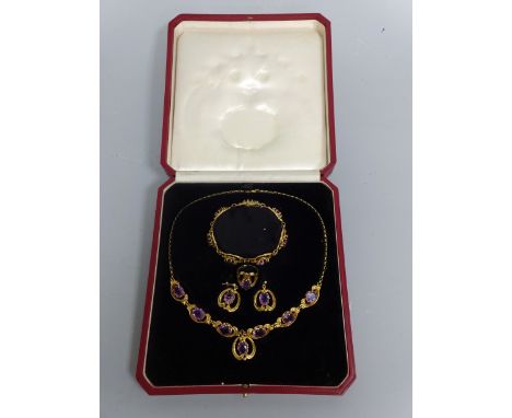 A BOXED 9CT GOLD AMETHYST SET SUITE OF JEWELLERY, comprising necklace, bracelet, earrings and ring (size M)