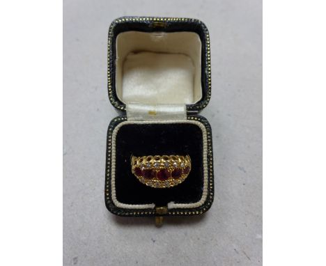 AN 18CT RUBY AND DIAMOND SET CLUSTER RING, (size L)