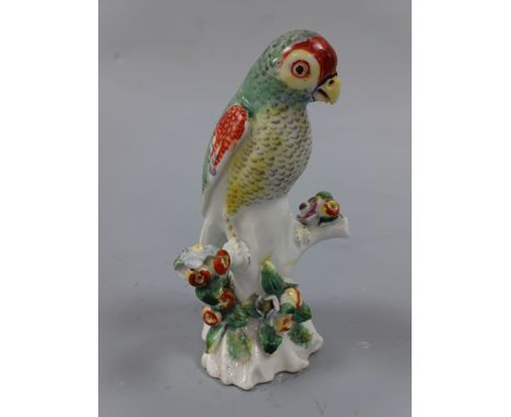 A DERBY PARAKEET FIGURE, c.1765, on floral encrusted branch, approximately 9.5cm high (a/f) (D. M & P Manheim New York and 49