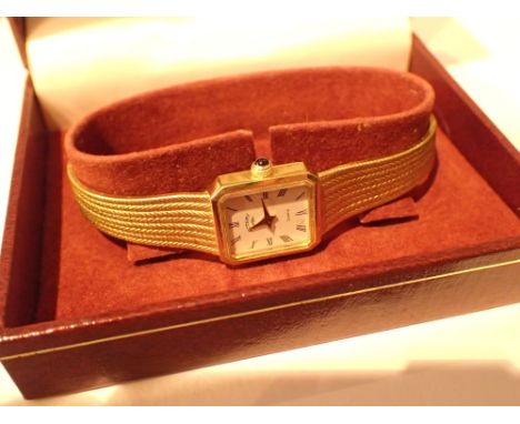 Boxed Rotary ladies quartz wristwatch with gold plated steel case and bracelet white dial displaying Roman chapters with no p
