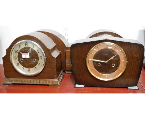 An Art Deco walnut cased mantel clock, the silvered chapter ring with Arabic numerals and signed Enfield, having eight day ch