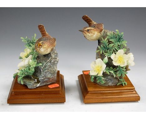 A Royal Worcester figure (Wren) Trogodyltes Parvutus and Burnett Rose, dated 1964, on hardwood base; together with one other 