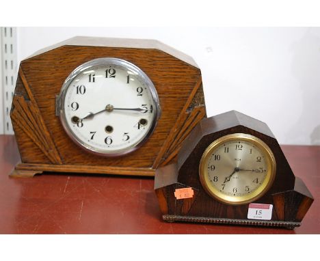 An Art Deco oak cased mantel clock, having enamelled dial with Arabic numerals and eight day movement striking on a gong; tog