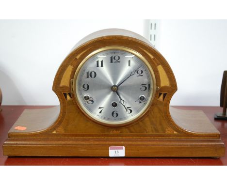 An Edwardian mahogany satinwood inlaid and chequer strung cased mantel clock, having silvered dial with Arabic numerals, and 