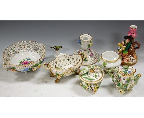 A small collection of assorted Continental porcelain items, to include; early 20th century Dresden floral encrusted candlesti