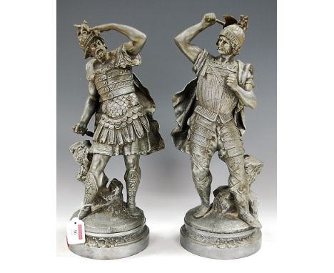 A pair of 20th century spelter figures of Roman soldiers in battle dress, h.45cm   Condition Report / Extra Information  Axe 