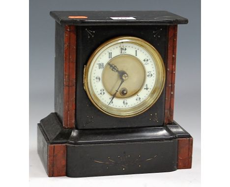 An Edwardian black slate and faux rouge marble cased mantel clock, having enamelled dial with Arabic numerals and cylinder mo