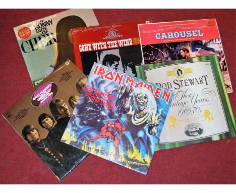 A box of assorted long playing records to include Iron Maiden - The Number of the Beast, Spotlight on Shirley Bassey, and one