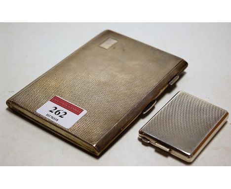 A George V silver matchbook holder, having all-over engine turned decoration, maker Adie Brothers, Birmingham 1933; together 