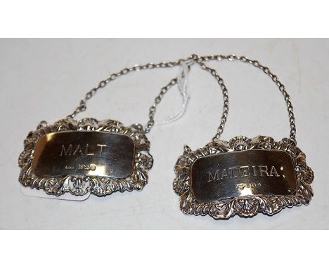 A matched pair of modern silver decanter labels for Malt and Madeira