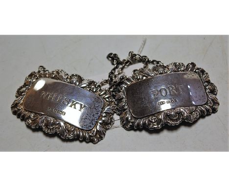 A matched pair of modern silver decanter labels for port and whisky