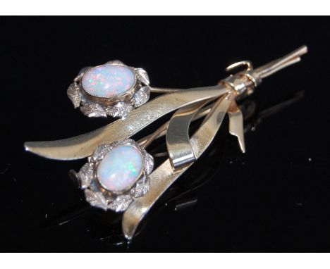 A 10ct gold opal set leaf and flower brooch, 4.8g, 5cm