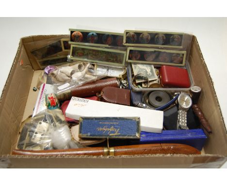A box of miscellaneous items, to include; various early clay pipes, reproduction mantel clock, cigarette cards etc 