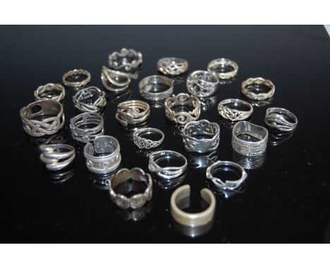 A bag of silver and white metal rings, largely being Celtic influenced examples, 105g