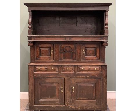 18TH CENTURY WELSH OAK TRIDARN panel back canopy top on turned and block supports, centre section of twin cupboard chamfered 