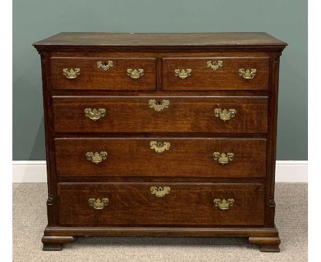 GEORGIAN OAK CHEST  two short, three long oak lined drawers,  moulded edging, fancy brass backplates, swing handles, panel si