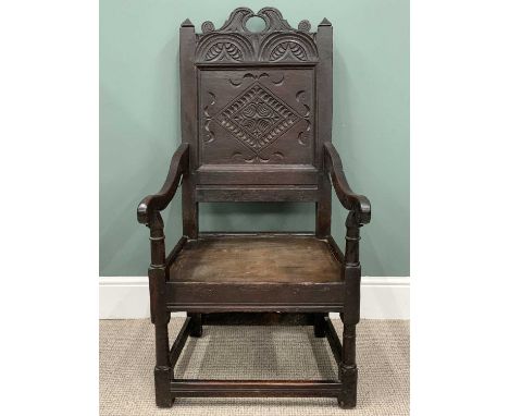 CARVED OAK ARMCHAIR circa 1800, peg joined construction, carved crestrail, diamond detail central panel, pyramid capped uprig