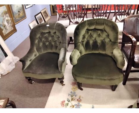 Two late Victorian green upholstered button back armchairs with slight differing designs to the legs