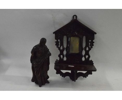 Mixed Lot: A small 19th Century carved figure of a Saint together with a Black Forest type small mirrored wall shelf, largest