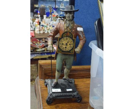 Small Dutch figural mantel clock formed as a gent with a walking stick, 40cm high