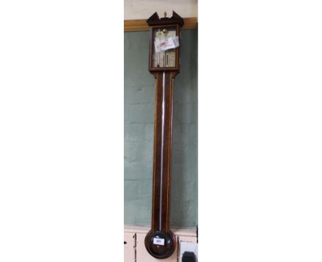 An inlaid mahogany stick barometer