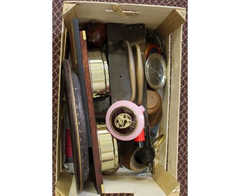 A clock, barometer and a metal stand