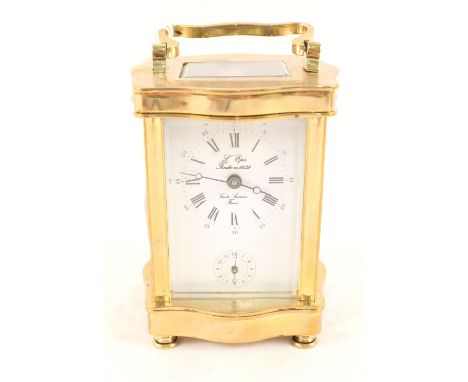 A French brass carriage clock, dial marked Saint-Lauxanne