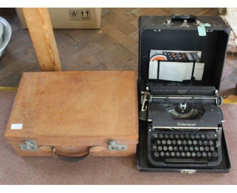 A small leather suitcase, black Underwood typewriter, Copeland Spode jug and bowl plus a glass shade