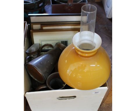 A brass oil lamp, copper jugs and frames