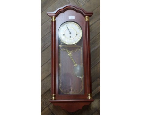 A Chinese red ground floral rug plus a modern wall clock