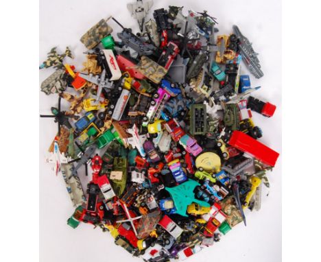 A large collection of loose Micro Machines vehicles to include; trucks, tankers, army vehicles &amp; tanks, boats, helicopter