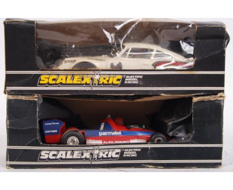 Two vintage 1/32 scale Scalextric racing slot cars of models; C.125 Porsche Turbo 935 &amp; C.120 Martini Brabham BT 44B. Bot
