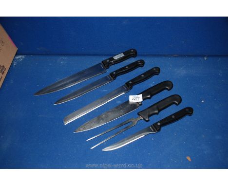 Four cooking knives by Rostferi plus two others including a carving fork.