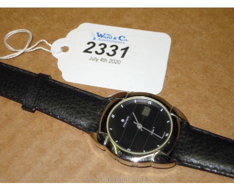 A gentleman's Junghans Quartz solar watch  with black face and strap, no box.