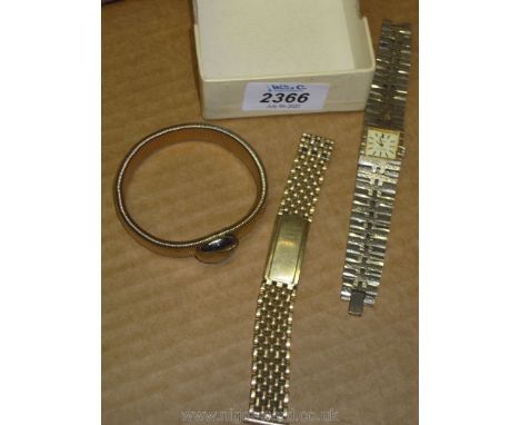 A rolled gold gate style watch wristlet, 148 mm long approximately, as found, an expanding arm band and silvered finish ladie